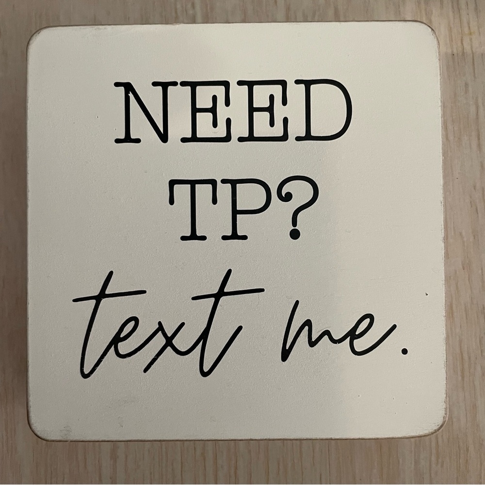 Bathroom sign. Text me sign.